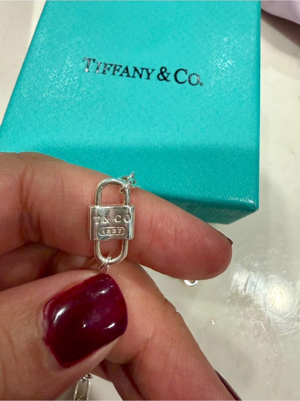Tiffany & Co. Silver Padlock Pendant Necklace with Blue Box Accent